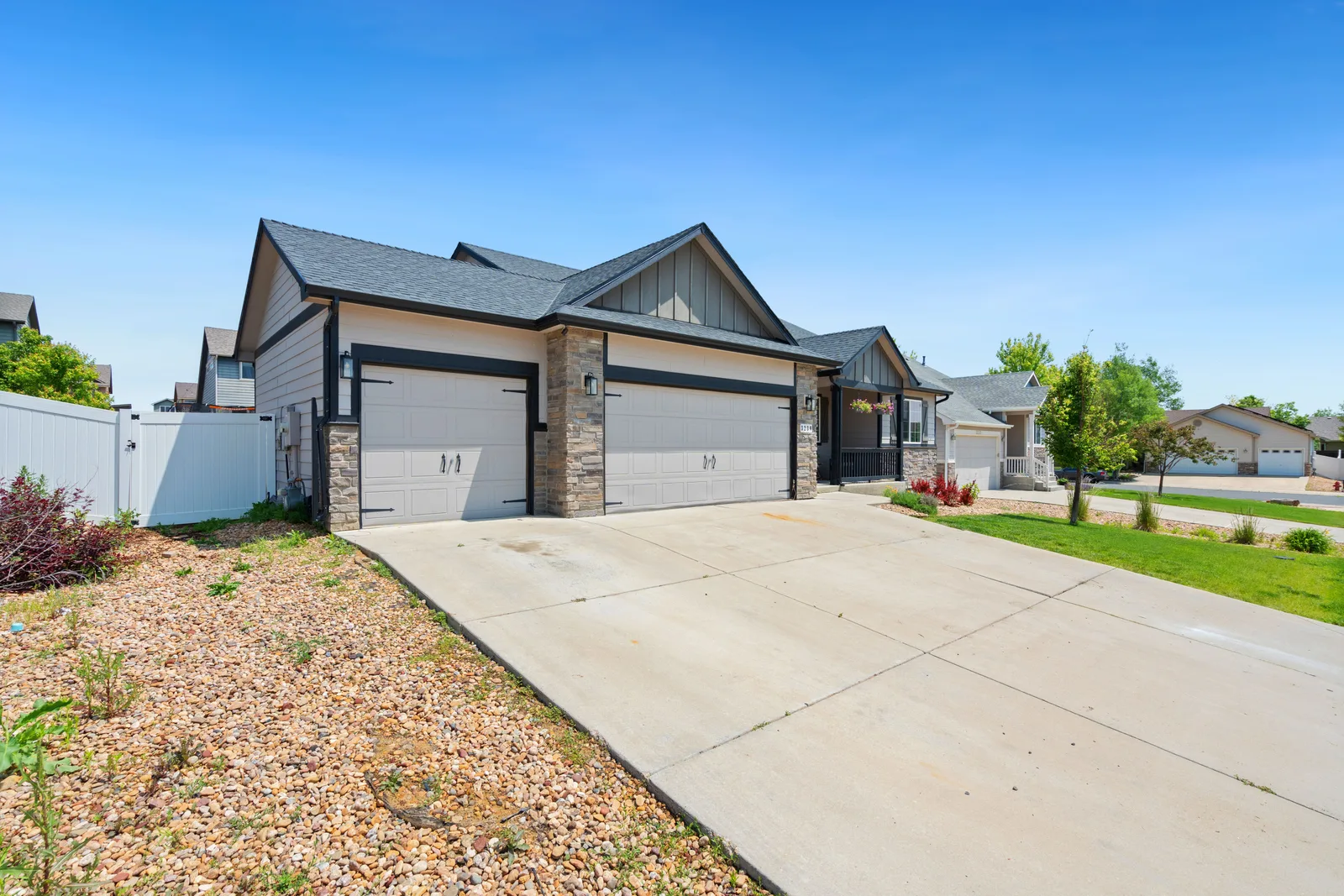 Two sectional garage doors on a representative suburban home